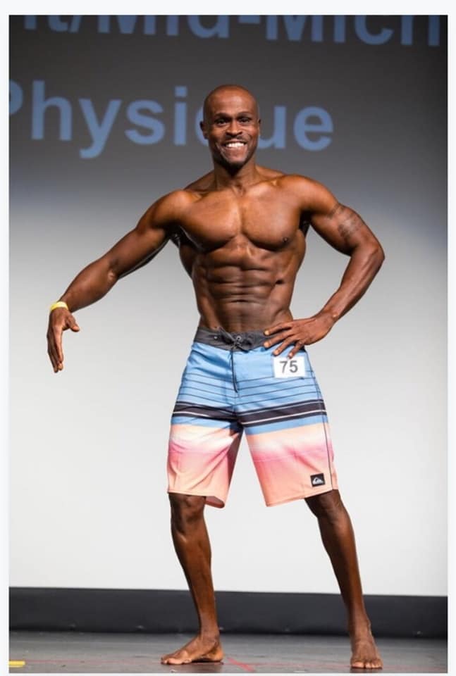 Moh on stage at 2018 NPC Flint/Mid-Michigan Physique